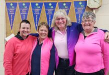 Golfers brave weather for a cause