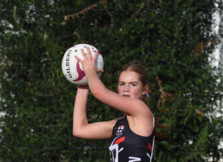 Saints hold off fast-finishing Tigers